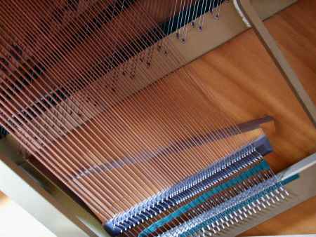 "floating" soundboard for which Rippen were famous; the lest hand edge is not attached, allowing a reverberant bass tone.